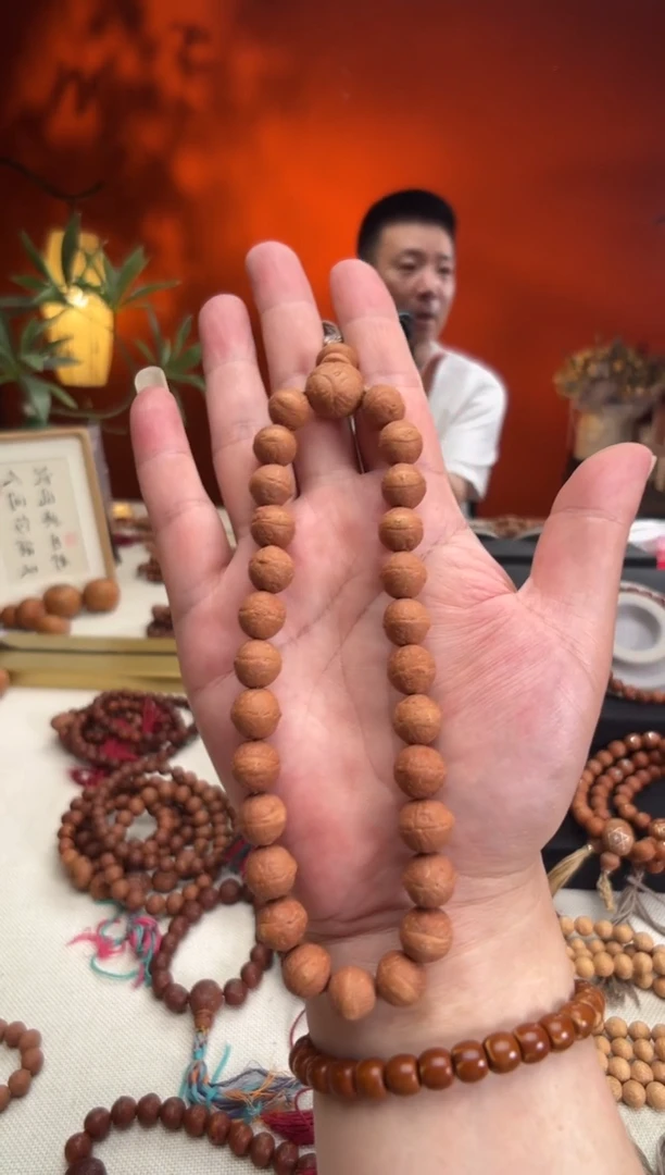 凤眼菩提吊坠长*。11.5毫米手持27颗