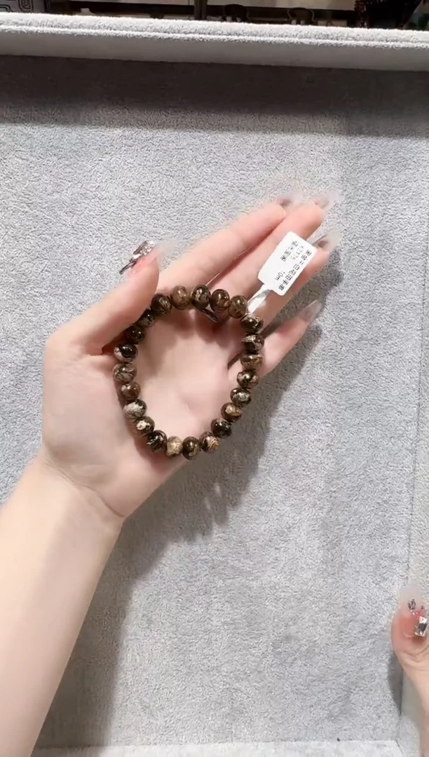 琥珀未镶嵌珠宝奇石慧*抚顺琥珀       黑金干白花10M