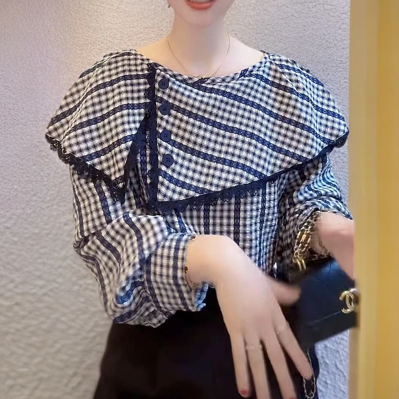 2025春季新款韩系时尚气质百搭小众不规则翻领设计款荷叶领衬衫女