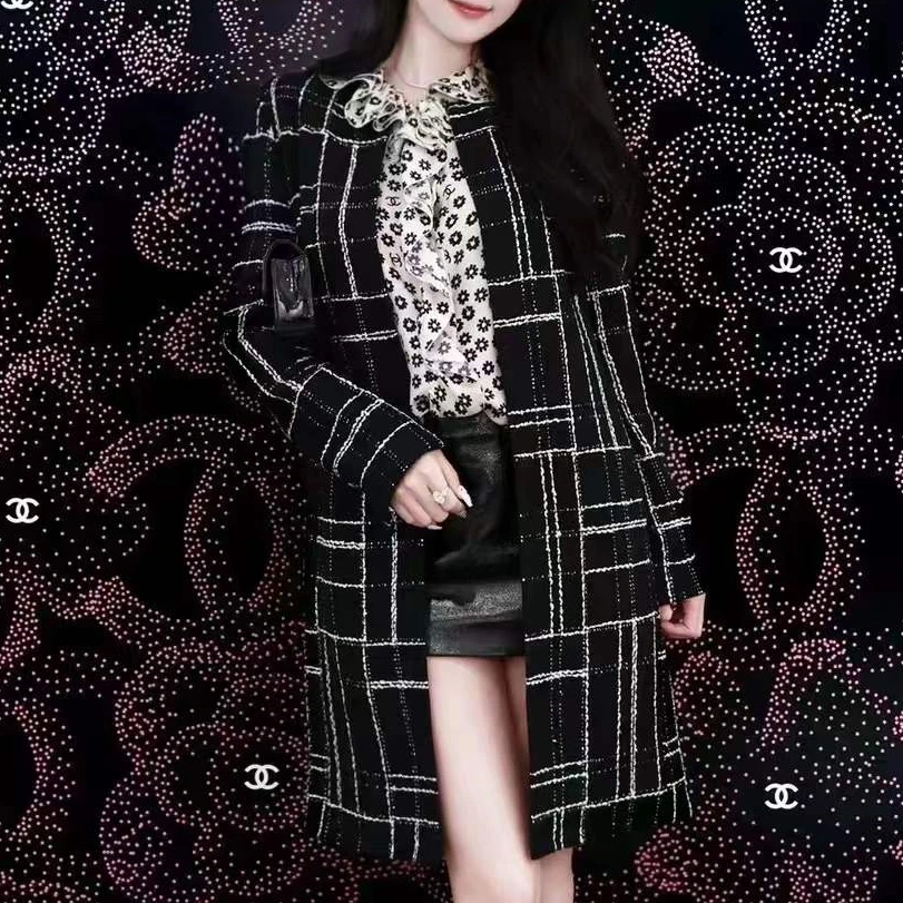 99新 Chanel/香奈儿 42码23A黑白不规则格纹长款外套