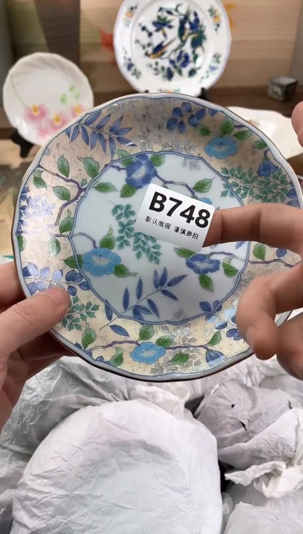 瓷片麒*哥748