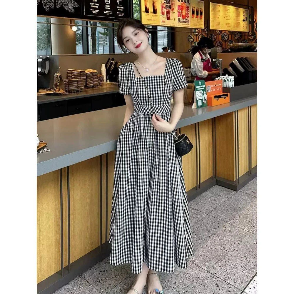 欧洲站2025夏季新款法式赫本风长裙复古高级感气质显瘦格子连衣裙