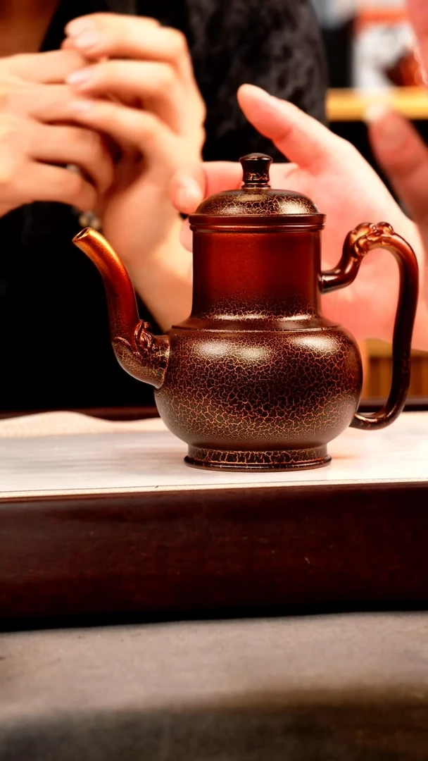 茶壶紫砂金贝烧 酒樽壶