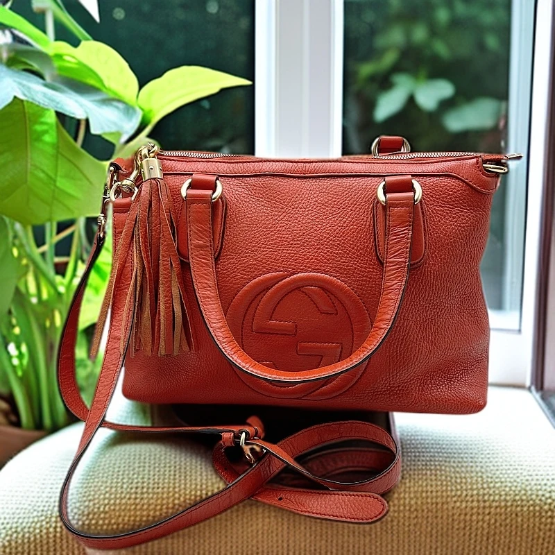 95新 GUCCI/古驰 橙色斜挎包 1094 4380