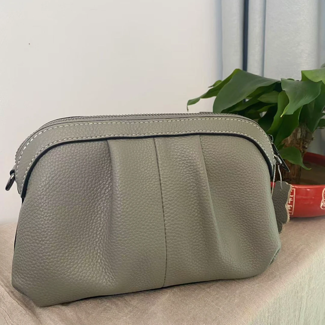 升级加大版头层牛皮日用手抓包休闲实用零钱包大容量多隔层手机包