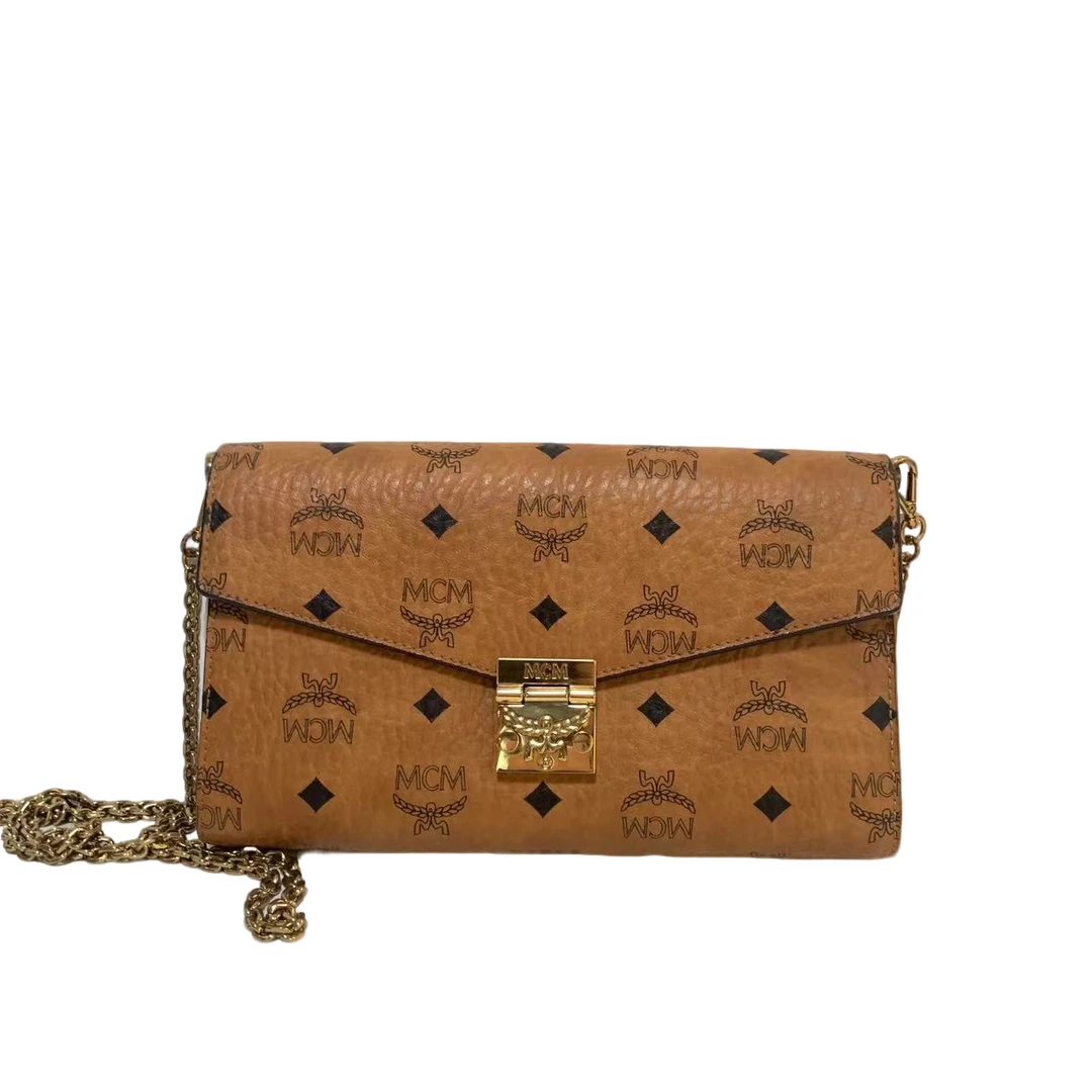 95新 MCM MCM 老花信封斜挎包bwz10511