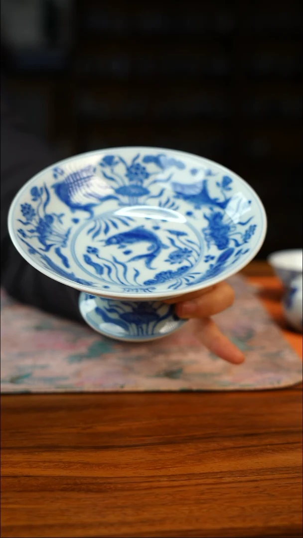 源明青忆鱼藻纹高足盘