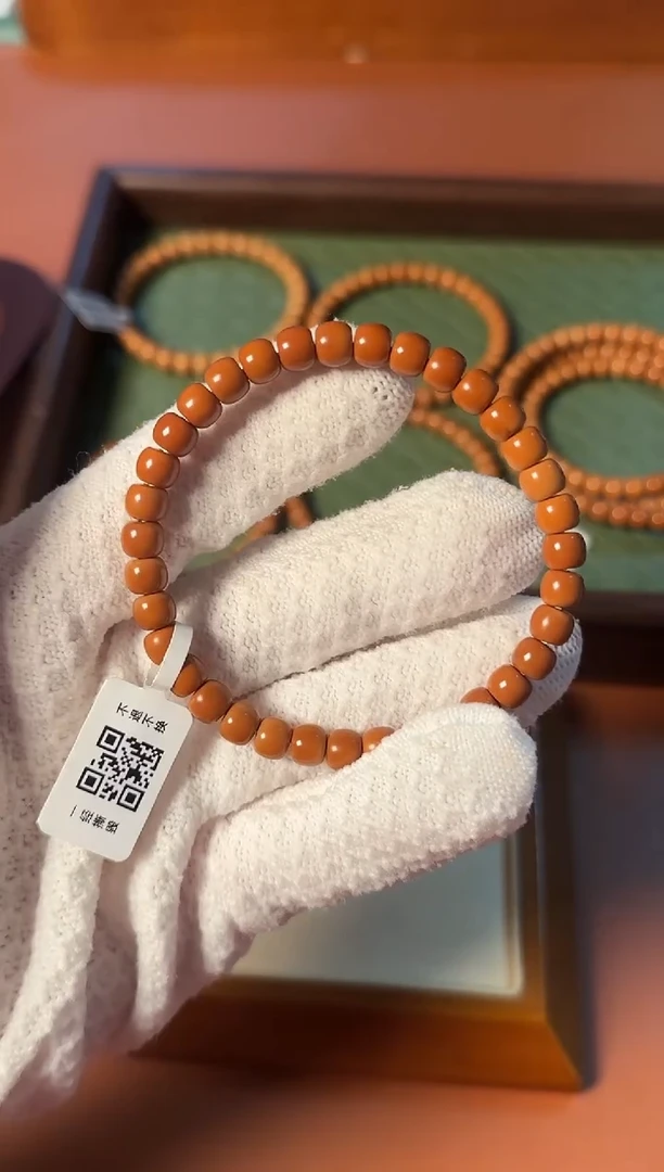 手串橄榄核6.6mm 老挝核尖单圈 红皮面无白一代料