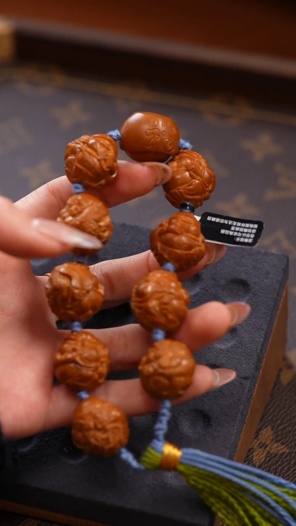 手串/手链橄榄核花****惜财神