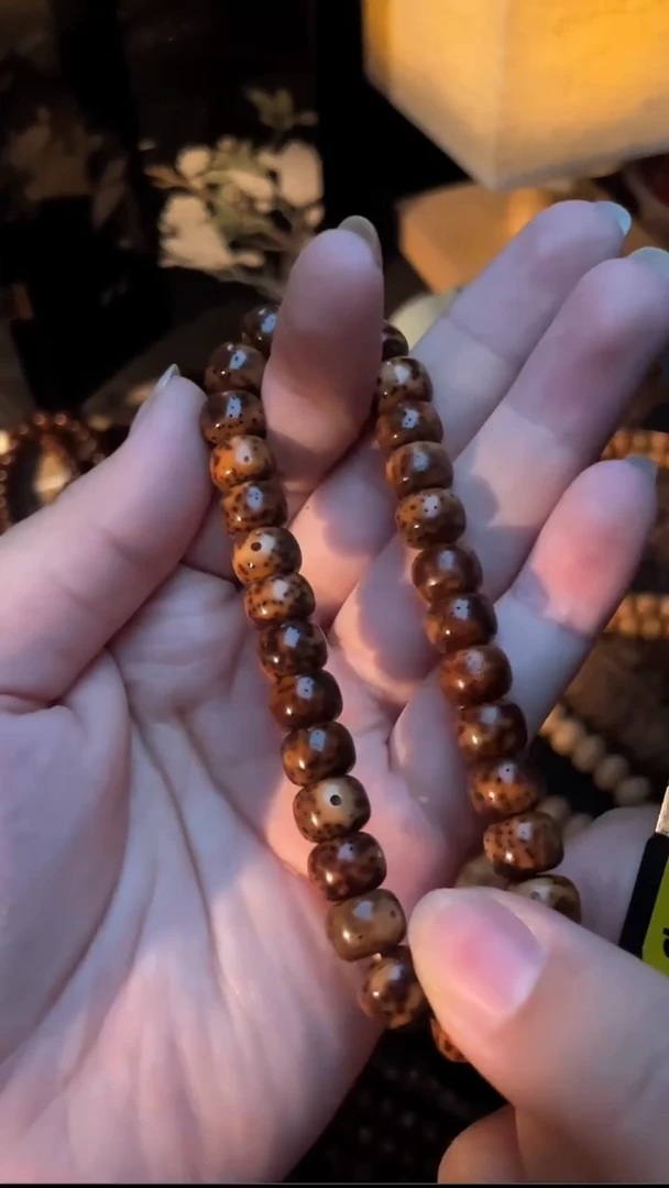 吊坠星月菩提精工级中珀花皮新桶9*7手串