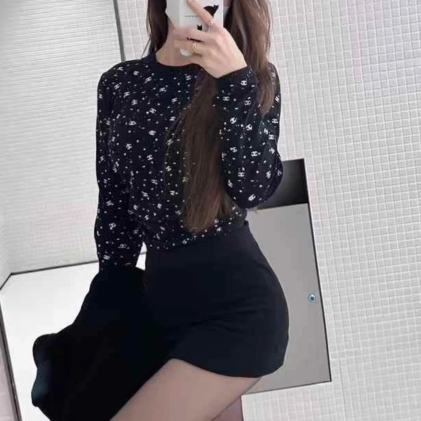 99新 Chanel/香奈儿 38码屋顶系列秀款深蓝色满天星双C长袖上衣