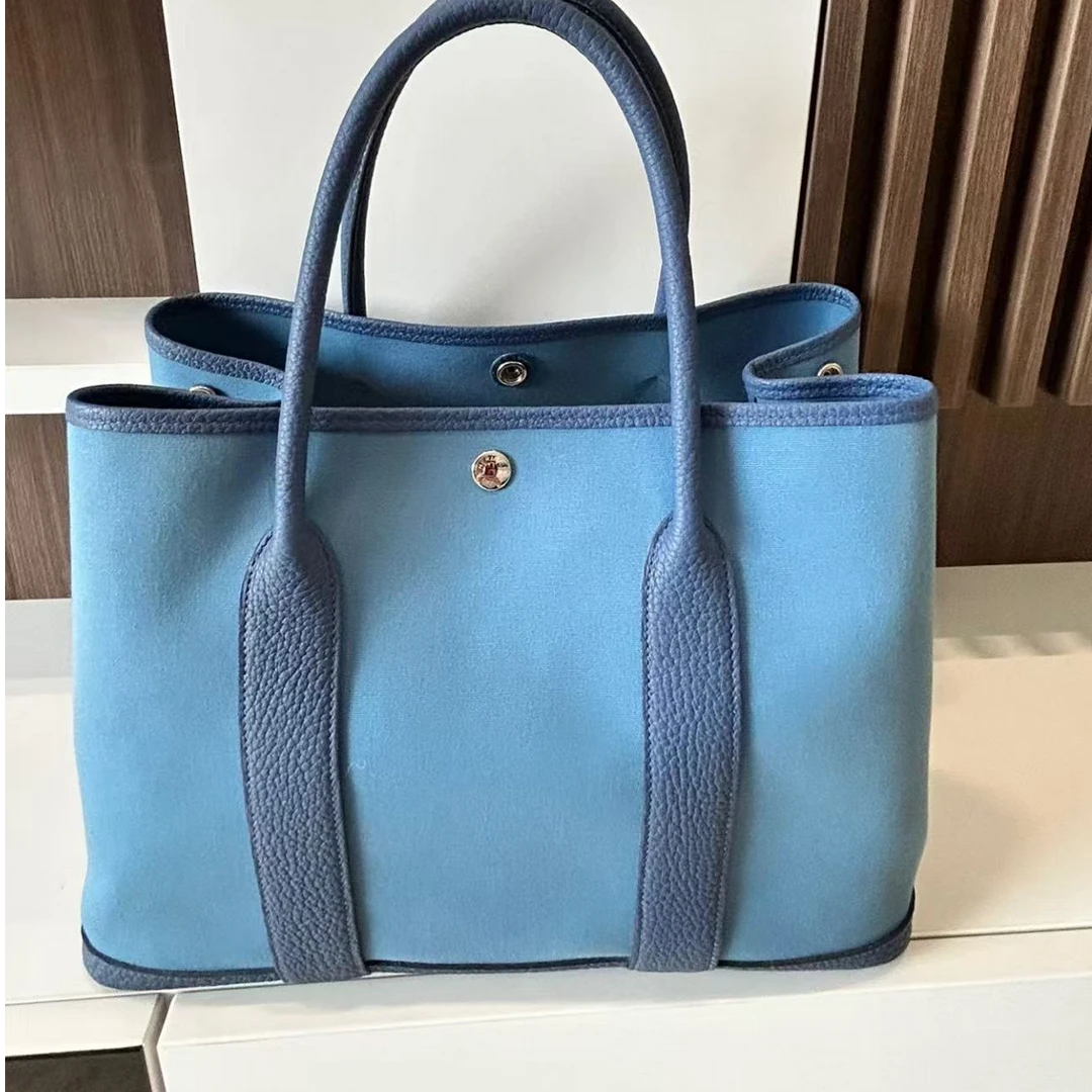 99新 Hermes/爱马仕 爱马仕花园36帆布拼皮蓝色z手提包