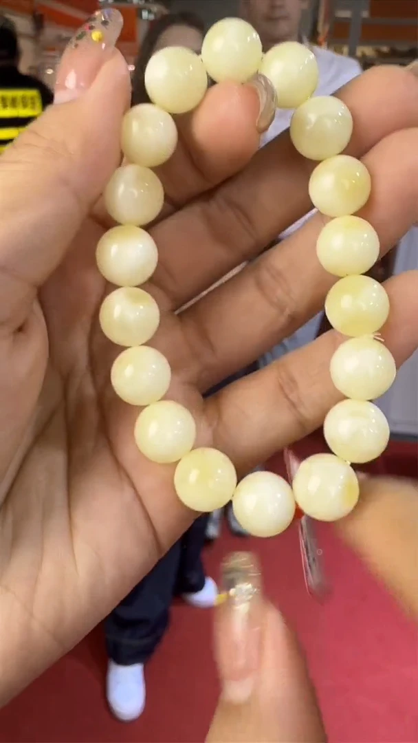 未镶嵌琥珀手链上海珠宝展假一罚十