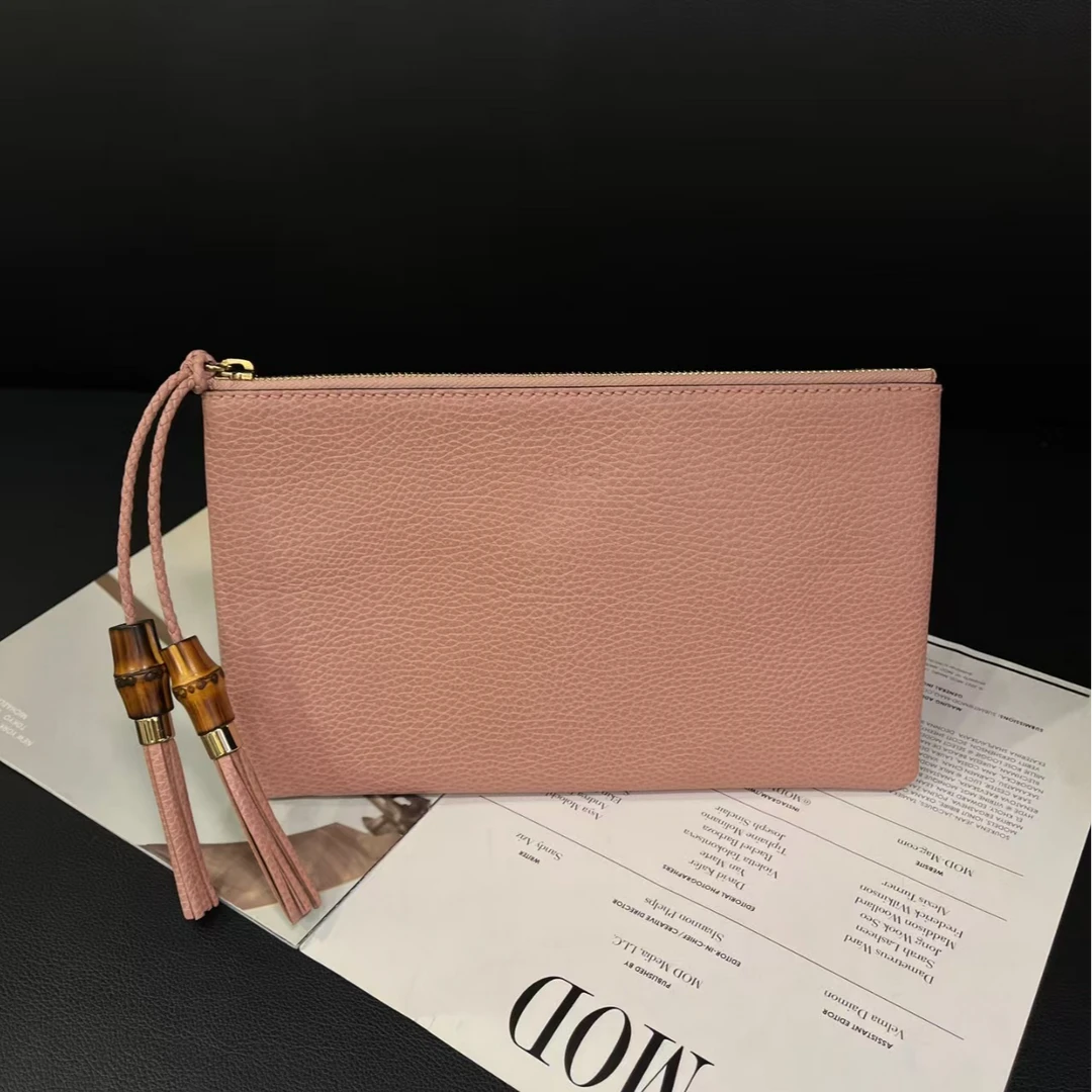 95新 GUCCI/古驰   粉色流苏手拿包B6012