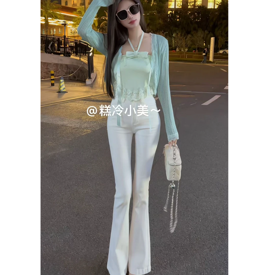 新款蕾丝拼接不规则蝴蝶结挂脖抹胸甜美蕾丝系带开衫牛仔喇叭裤