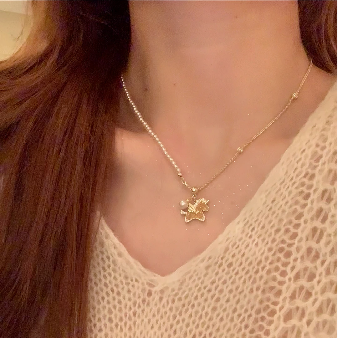 铜合金仿珍珠项链 秋冬轻奢本命年小马珍珠项链女气质毛衣链配饰