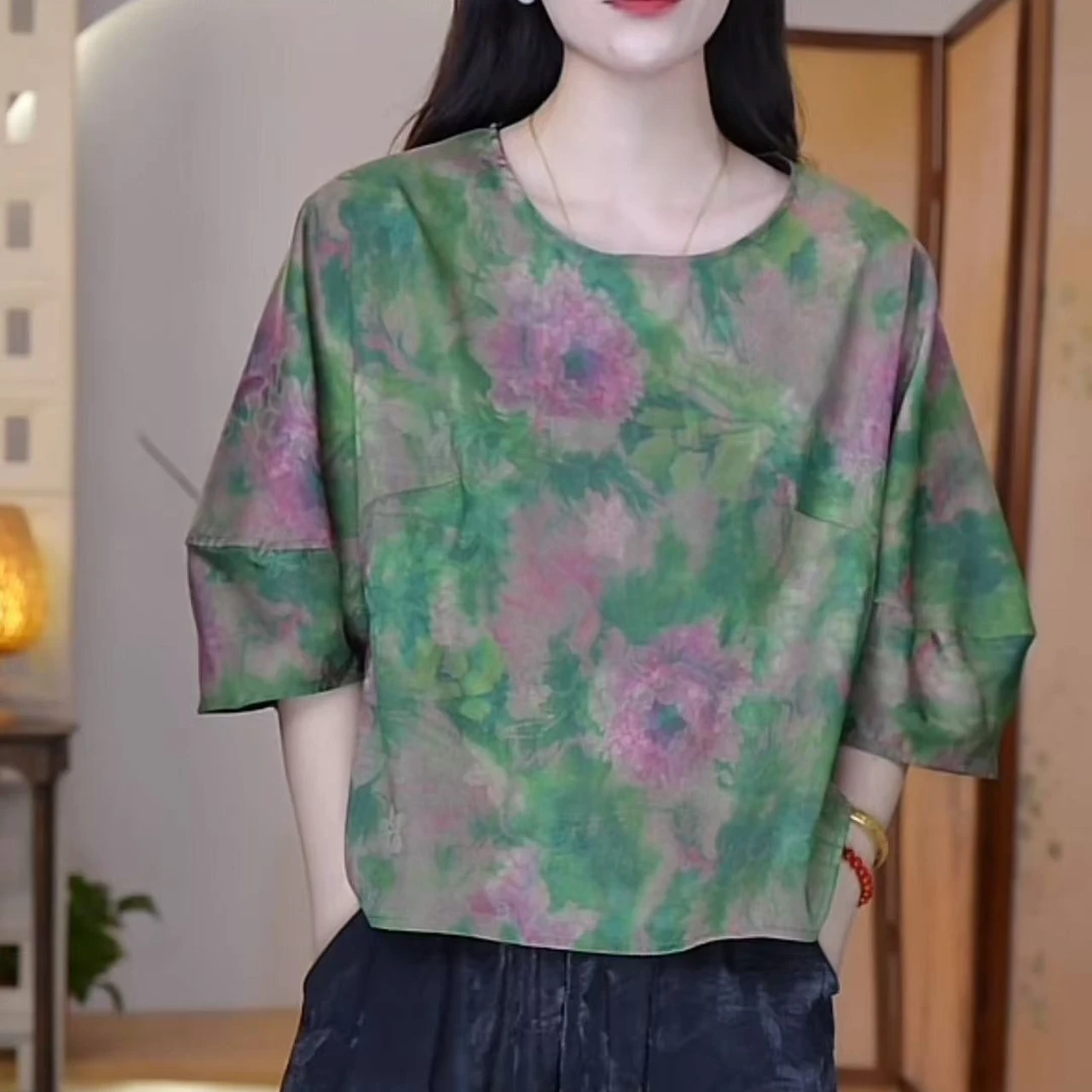 B080浅彩绿色系印花短款蝙蝠版小衫