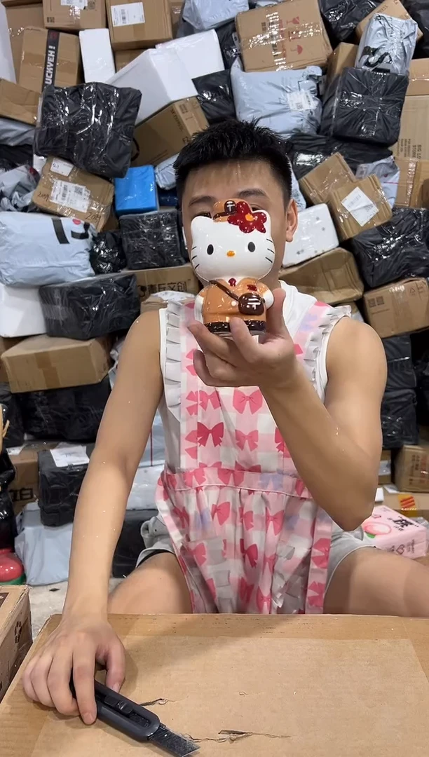 瓷片棕色kt猫邮递员存钱罐