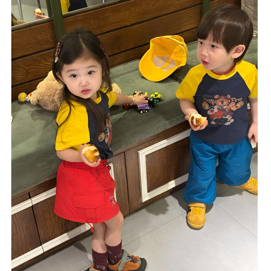 现货女童2025新款韩版儿童春装插肩袖卡通T恤工装裙裤子两件套