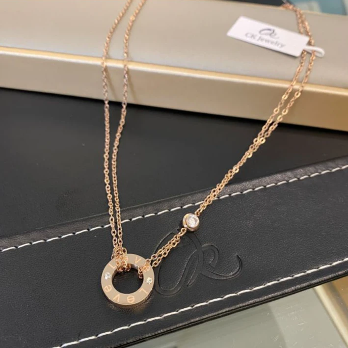 CK 钛钢锆石项链 玫瑰金色 LOVE圆饼项链 N406