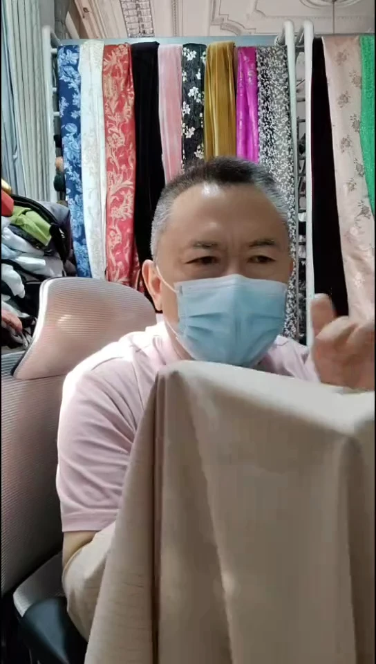 米驼色条纹精纺布料