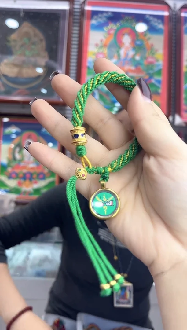 吊坠徐***?纯手绘唐卡 绿眼睛（不退不换）