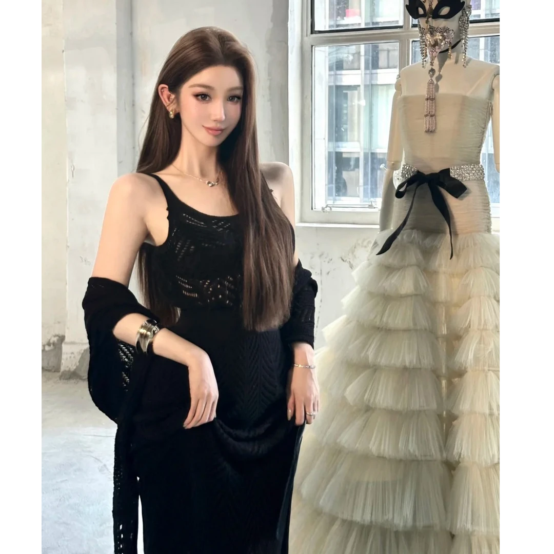 设计感镂空吊带连衣裙女2025秋季新款修身收腰针织纯欲风显瘦裙子