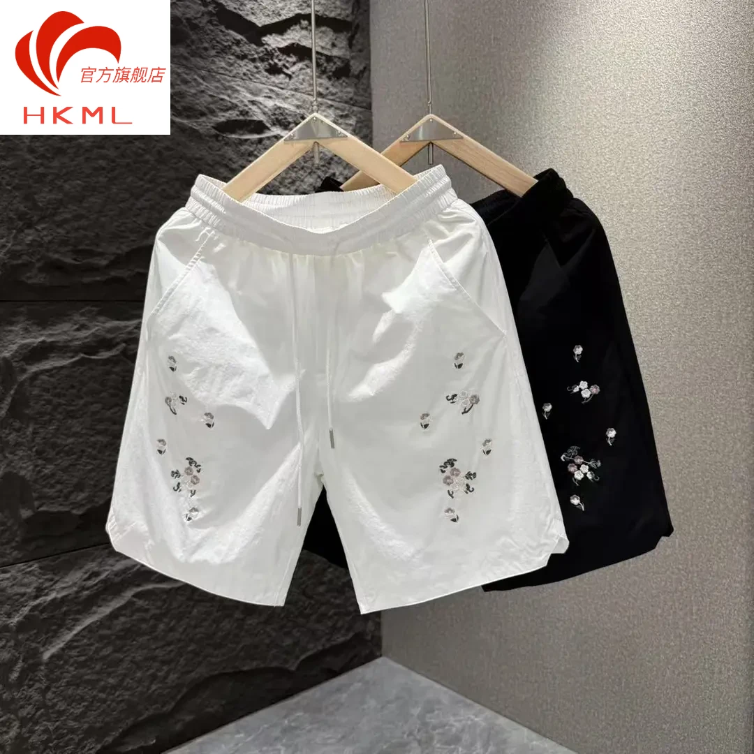 夏季休闲男士清新淡雅白色碎花刺绣时尚百搭速干薄款轻奢短裤裤子