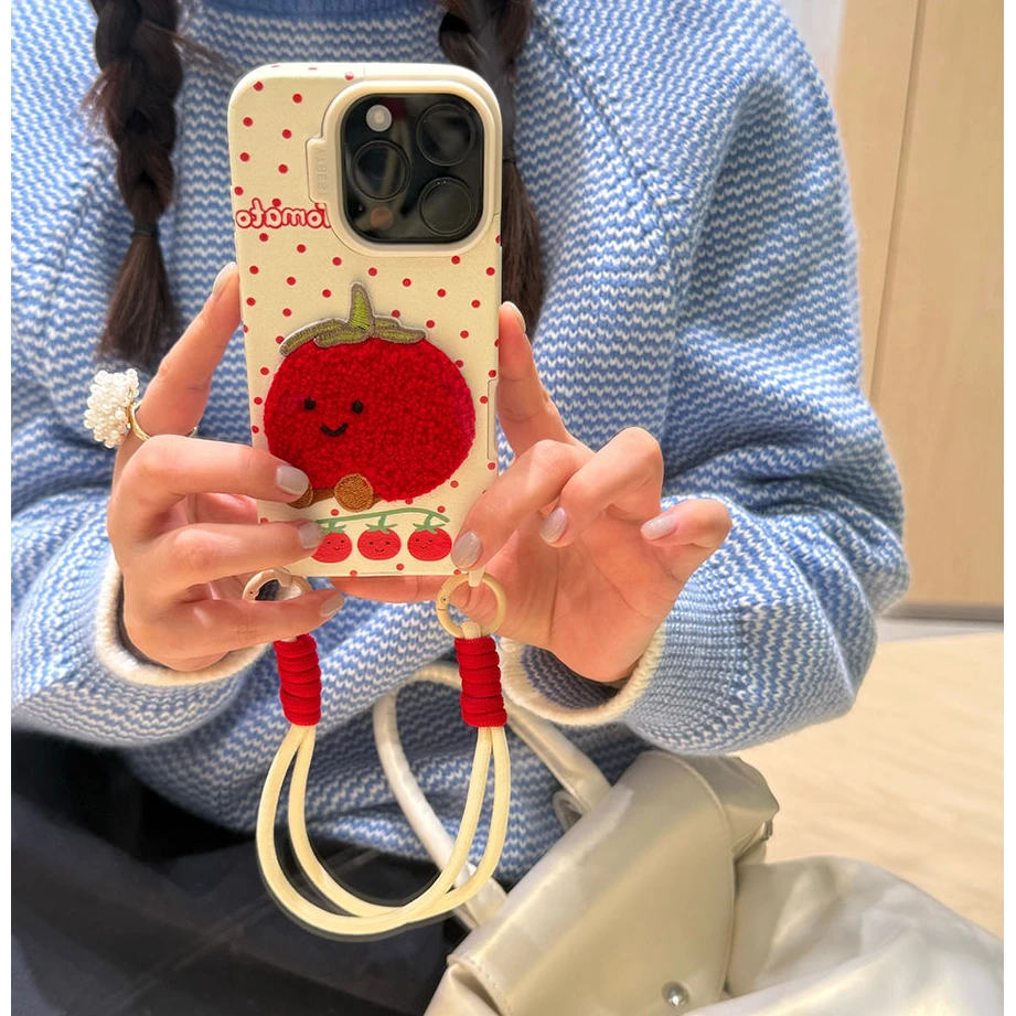 适用苹果16promax手机壳iPhone15皮纹14挂绳13波点12绒布刺绣番茄