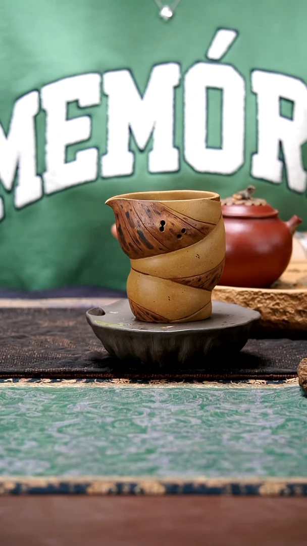 陈真《佛肚公道杯》