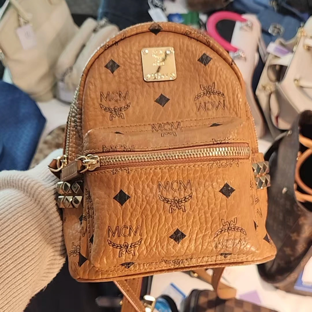 95新 MCM 干邑色小号双肩包/云海包展放大漏