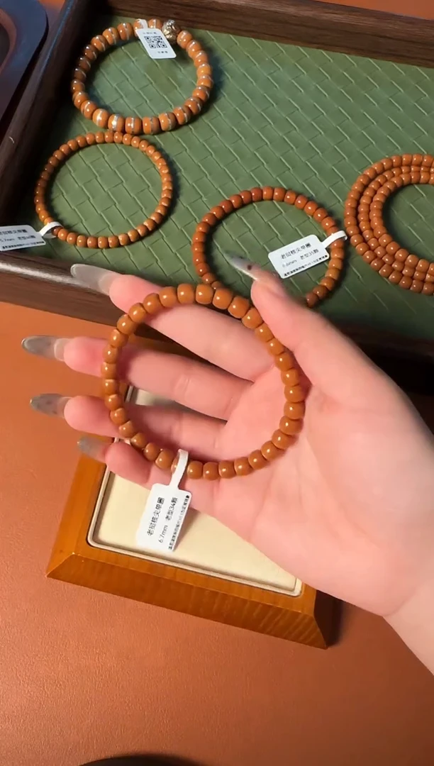 手串橄榄核6.7mm老挝核尖老型单圈、正三花