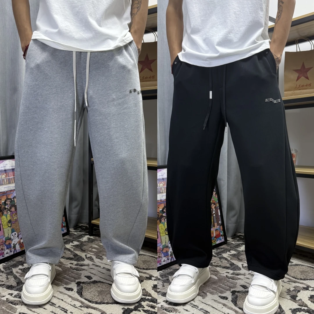 2025秋季新款潮牌拼接户外运动裤青年帅气弯刀裤男士宽松休闲卫裤