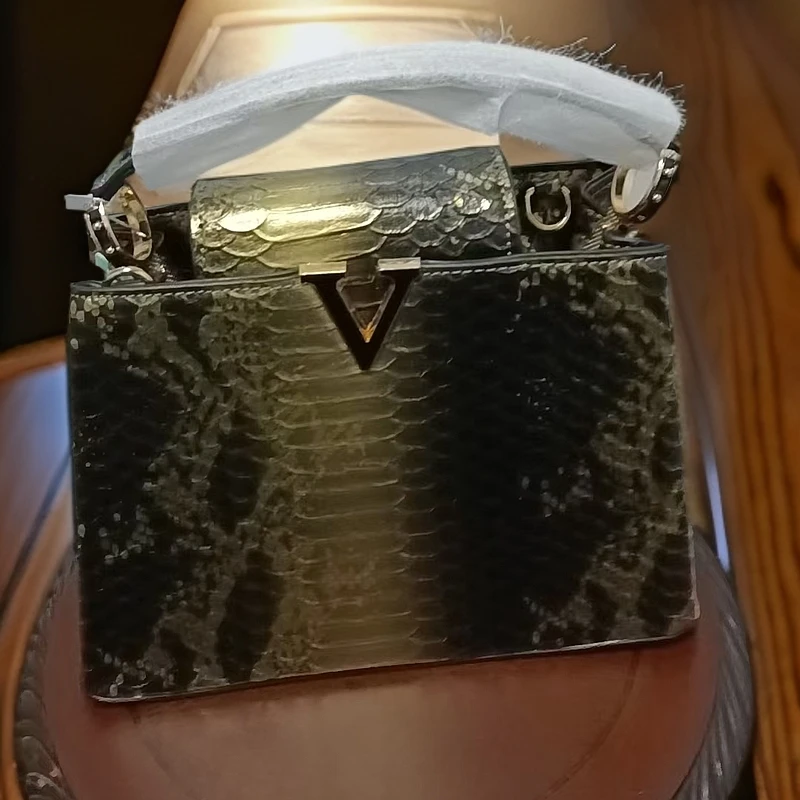 时尚潮流女款黑金款手提包10079金色气质百搭涛