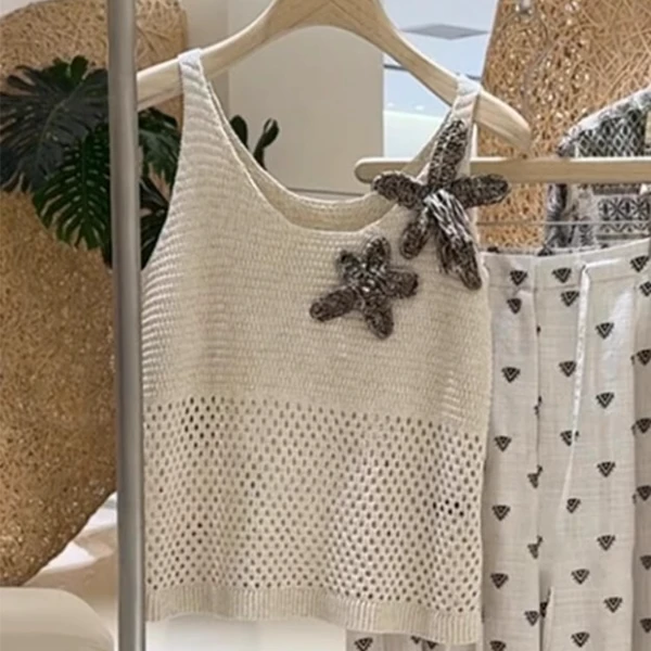 夏日洋气漂亮小上衣女2025新款时尚超好看出游度假风针织微奢服装