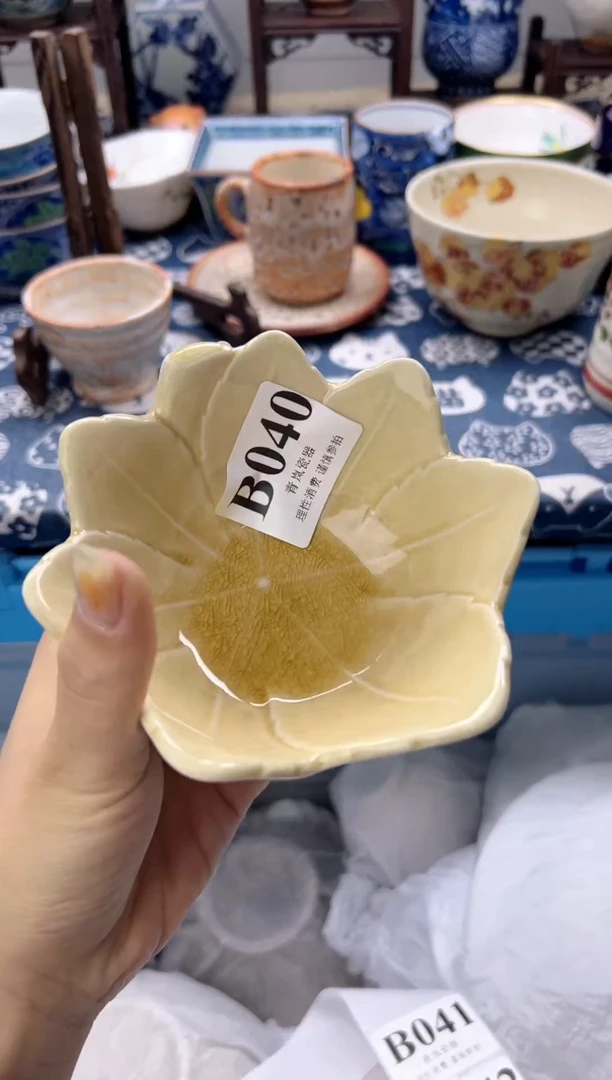 瓷片开**饺    B040