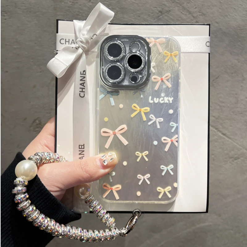 适用苹果华为荣耀oppo/vivo小米手机壳镜头膜羽纱蝴蝶结带手链女