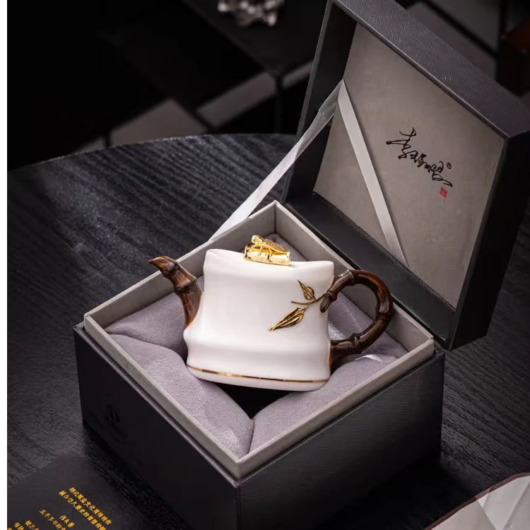 【李辉熠大师】高档羊脂玉瓷浮雕金蝉壶家用泡茶壶陶瓷茶具简约茶壶商品图