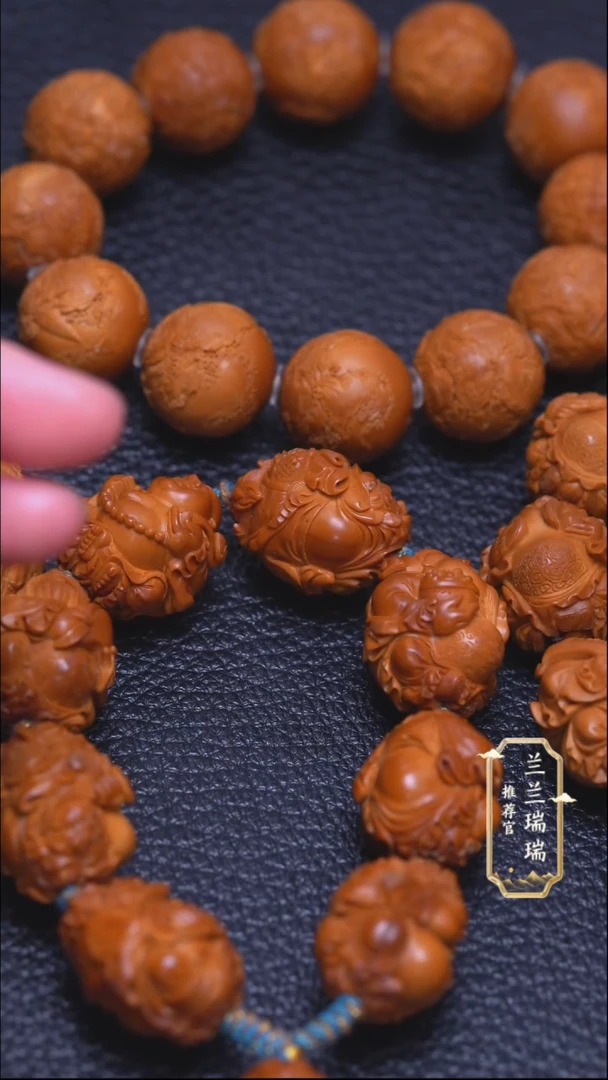 橄榄核手串/手链我****。金蟾