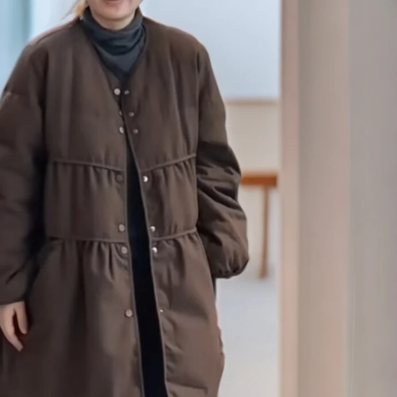 桔子布衣推荐冬季长款羽棉服