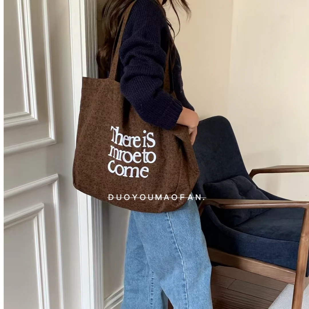 25新款豹纹牛仔大容量托特包包女复古水洗单肩包百搭通勤帆布包