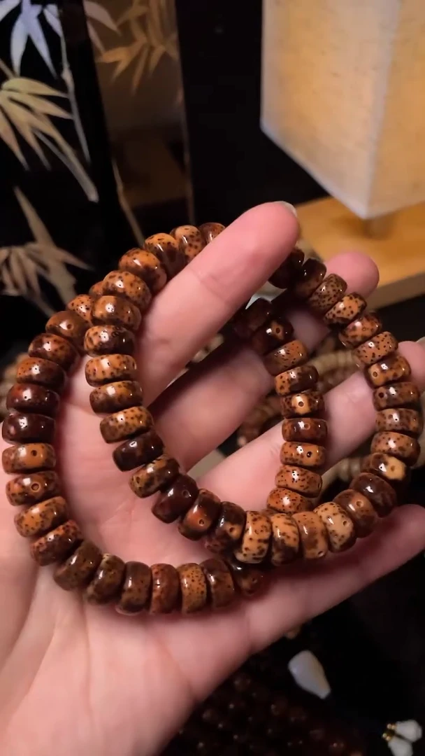 手串星月菩提精工级中珀花皮药片福利款11*6手串（B）