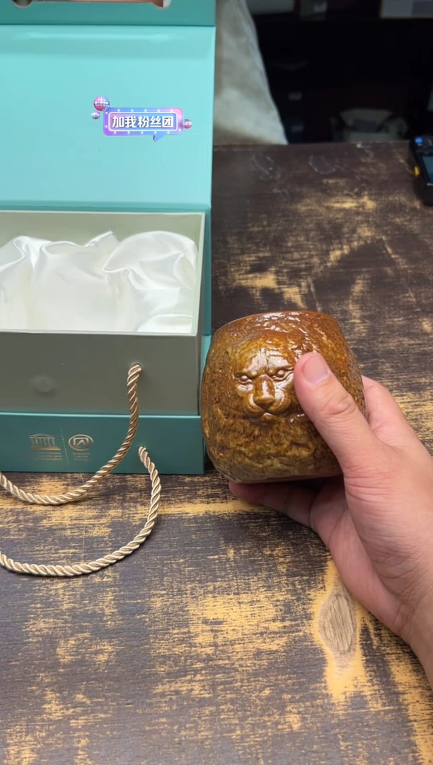 耗**哥潭城福虎捧杯