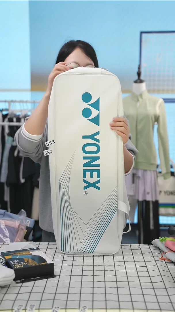 583清仓衣服，不退不换！！手提包白紫