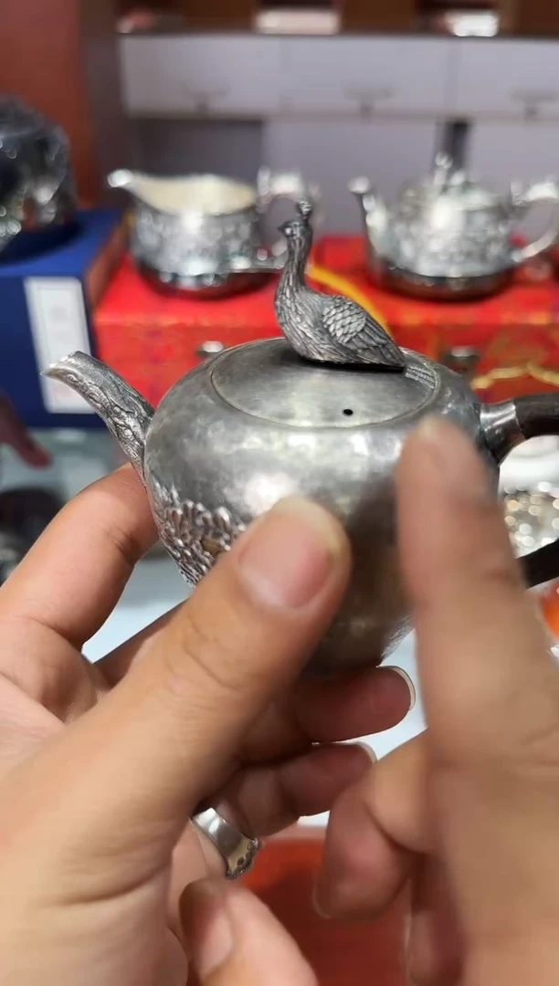 足银999精工手工牡丹孔雀熏色泡茶壶