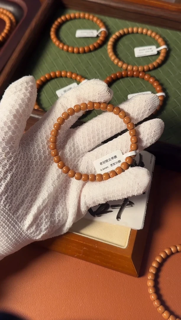 手串橄榄核【168核尖】6.6mm老挝核尖老型单圈正三花倒角白高油高密