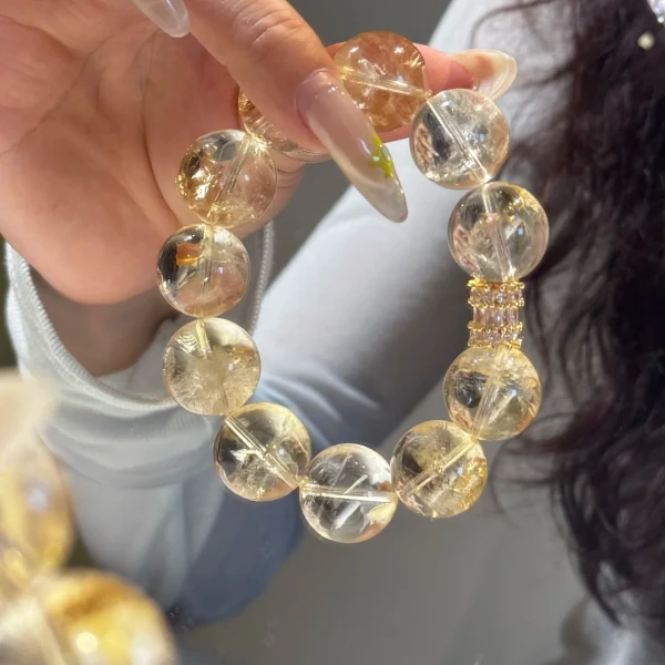 原创天然黄阿塞黄水晶斯特莱闪冰片净化手串女招财转运多样性发一