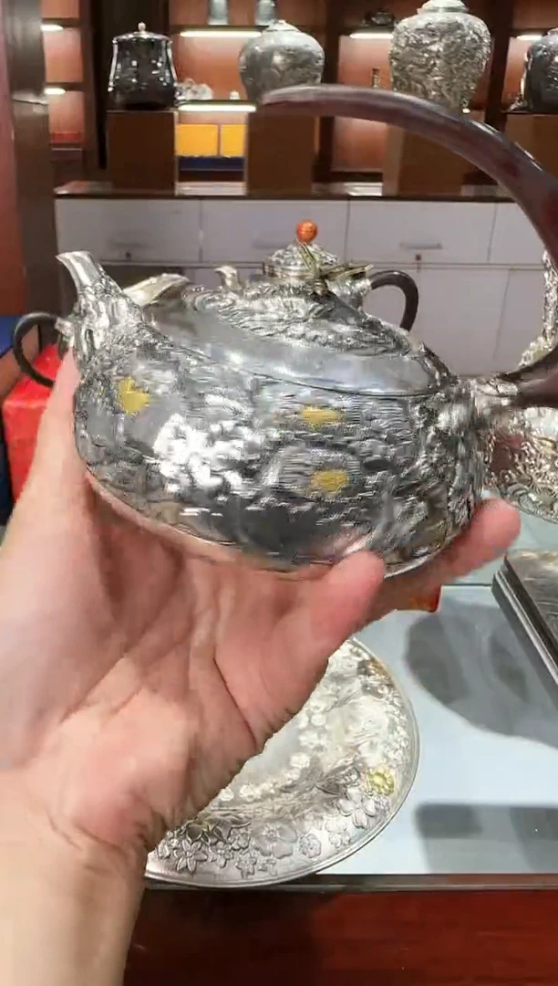 小****熊足银999精工手工牡丹高浮雕飞天牡丹泡茶壶