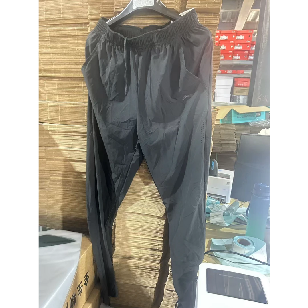 《B品以直播展示为准》李宁时尚系列男子纯色简约运动长裤AWBU201