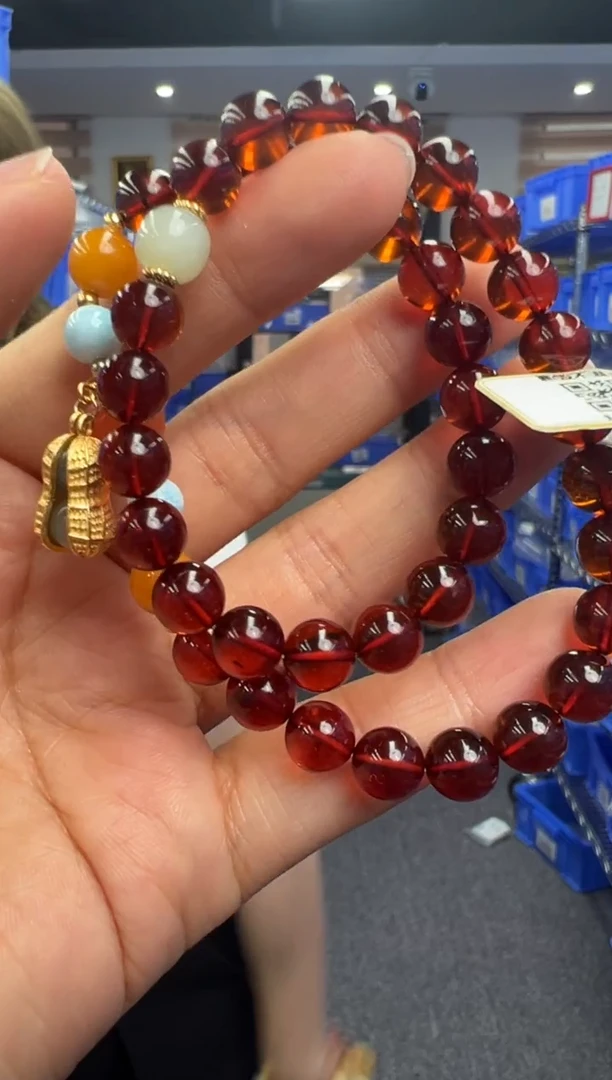 未镶嵌琥珀手链50秒拍号假一罚十